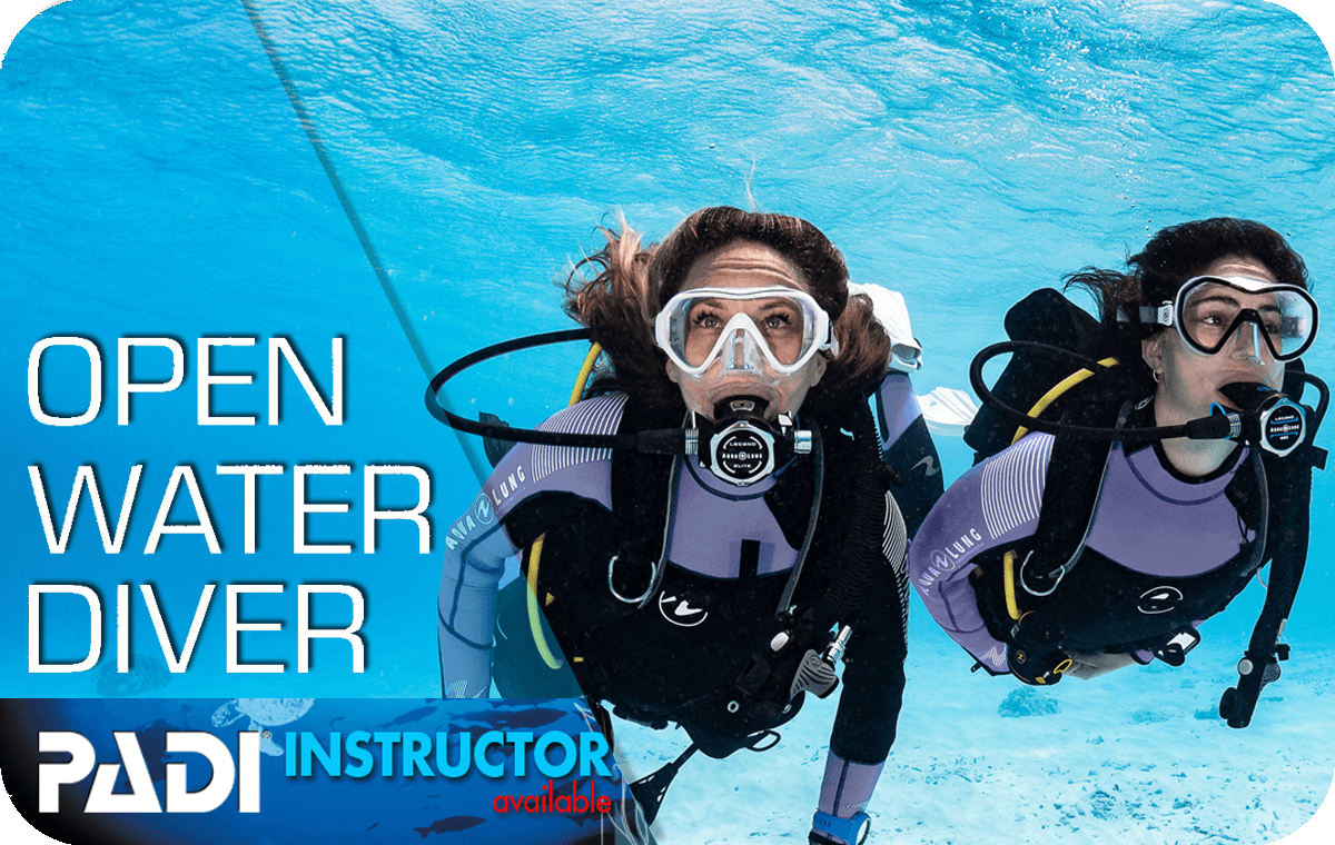 Student diver participating in an PADI open water scuba diving course, receiving instruction and guidance from a certified diving instructor, exploring the underwater world with proper scuba equipment in clear blue waters